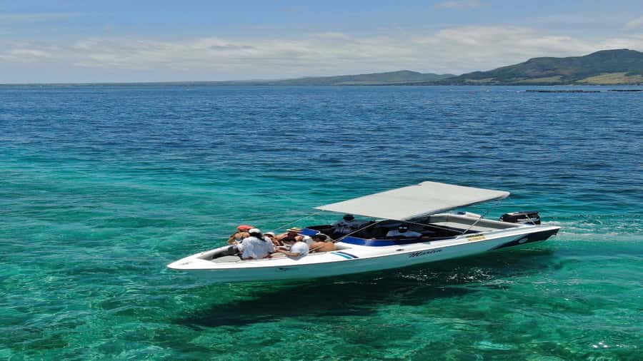 5 Islands Private Speedboat w/ Snorkeling + Lunch & Drinks - The day’s flow: Ile aux Cerfs, waterfall views, and monkey feeding