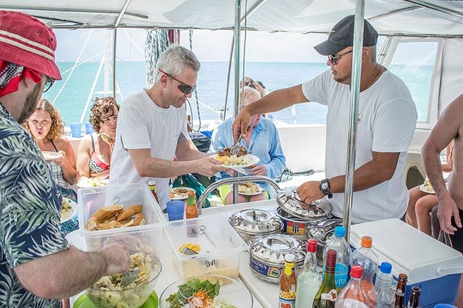 All inclusive CATAMARAN with BBQ : Ile aux cerf & GRSE waterfall - The catamaran experience: music, food, drinks, and comfort