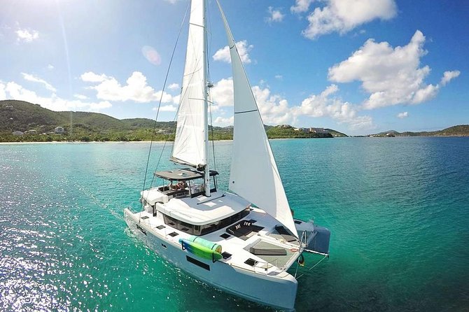 Catamaran Adventure Full Day: Ile aux cerfs,GRSE Waterfall,Snorkeling &BBQ Lunch - Hotel pickup, morning start, and what to expect getting to the boat