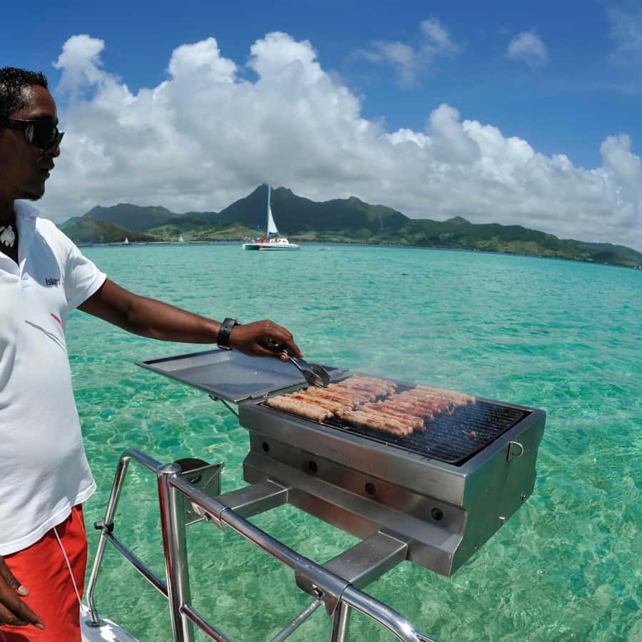 Catamaran trip to Ile Aux Cerfs With Two Way Transportation - The catamaran experience: friendly crew, good music, and a lively crowd