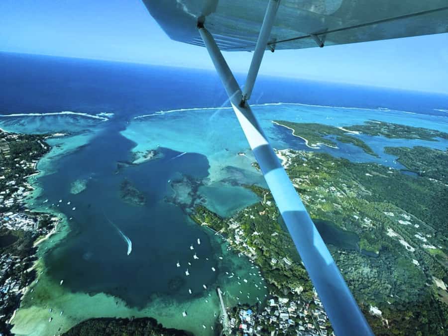 East Coast Mauritius Private Scenic Seaplane Tour - Île aux Cerfs from above, and why the colors look different in the air
