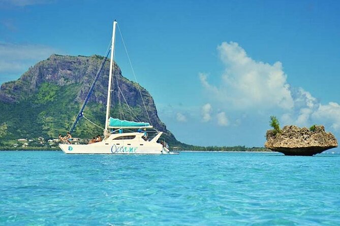 Full day Shared Speedboat Tour - South West Lagoon Dolphin Swim - Stop 4 return: back to Flic en Flac and onward to your hotel
