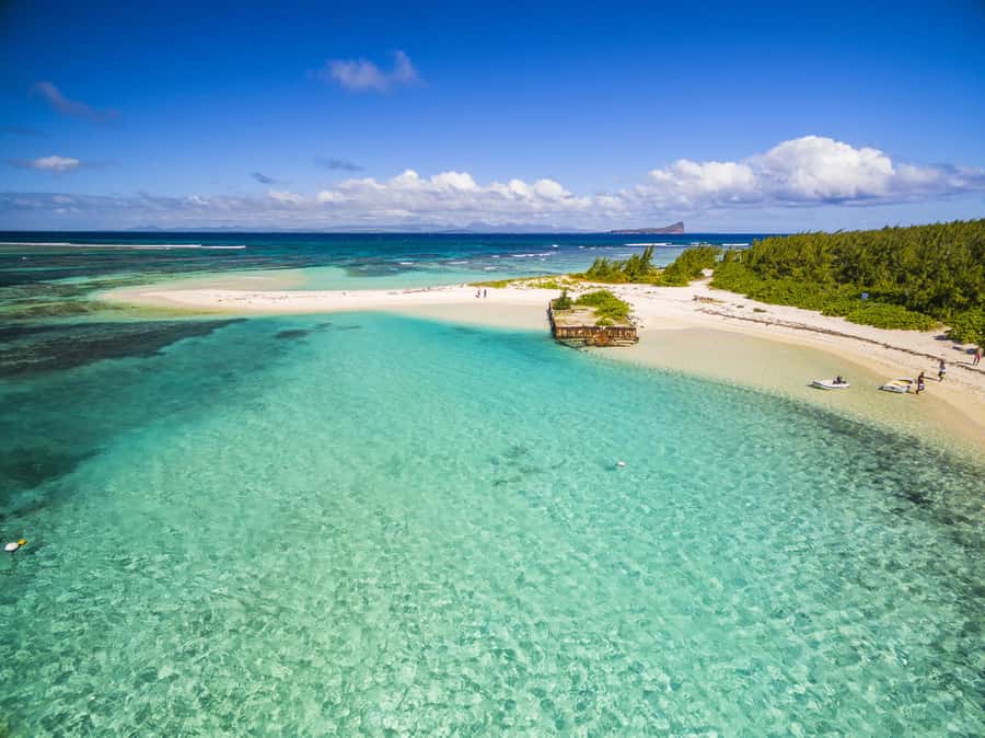 Grand Baie: Three Islands Private Boat Trip and Beach BBQ - Flat Island (Ile Plate): the beach time that sets the tone