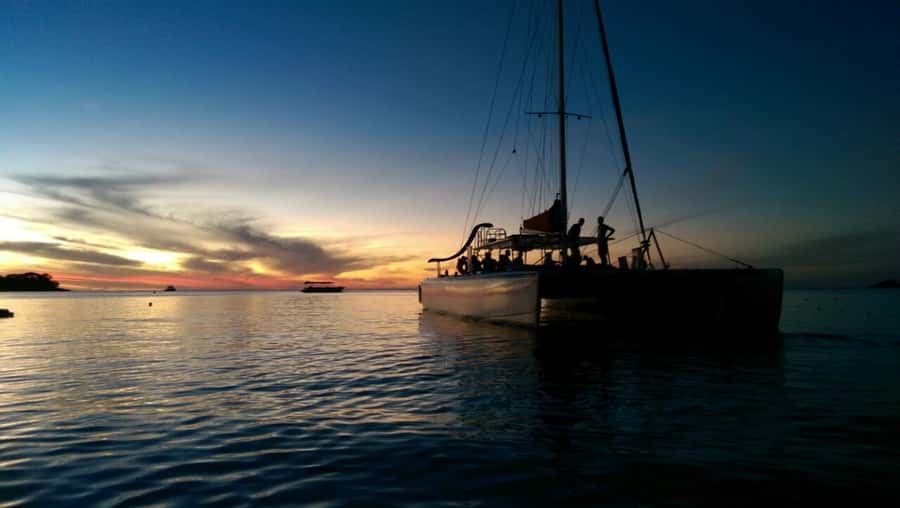 Grand Bay: BBQ Dinner on Catamaran & Short Sunset Tour - From Beach Meeting To Catamaran Life: What The Timeline Really Feels Like