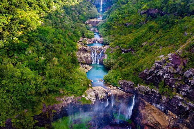 Guided Hiking The 7 WATERFALLS with relaxing car tour in the end - Ganga Talao: the sacred lake stop that breaks up the walking