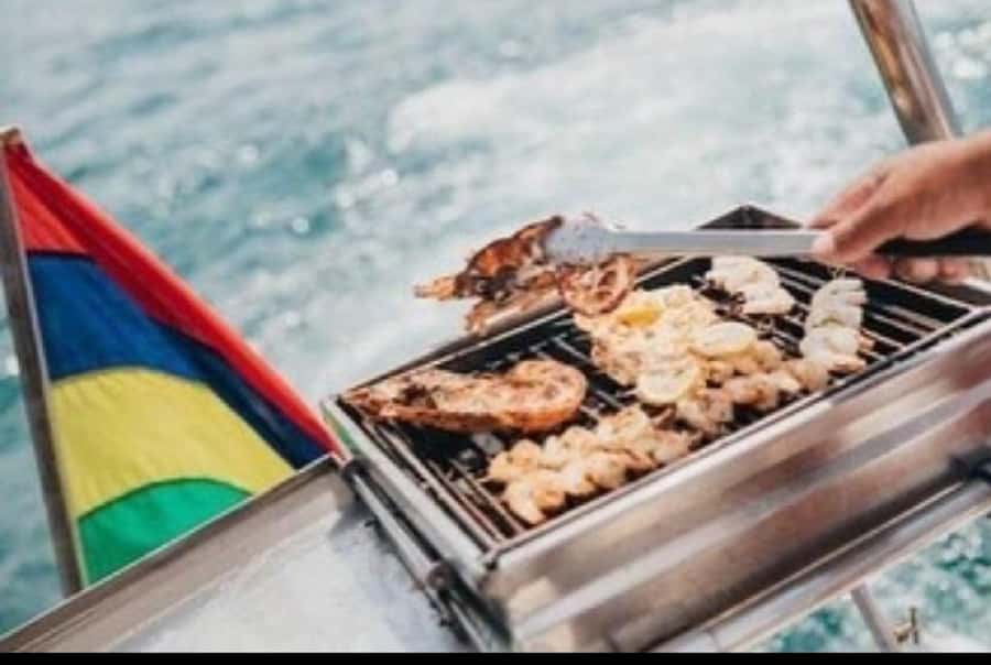 Ile Aux Cerfs Catamaran Cruise with Pick-up/Drop-off & Lunch - What’s Included at Lunch: The On-Board BBQ That Makes the Day Easy