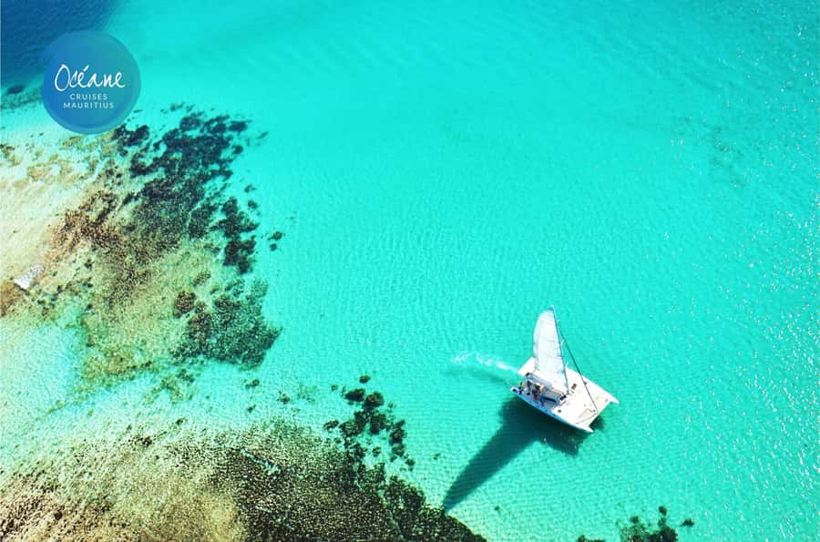 Île aux Cerfs: Private Catamaran Cruise with Gourmet Lunch - Ile aux Fouquets Lighthouse, aperitif, swimming, and reef snorkeling