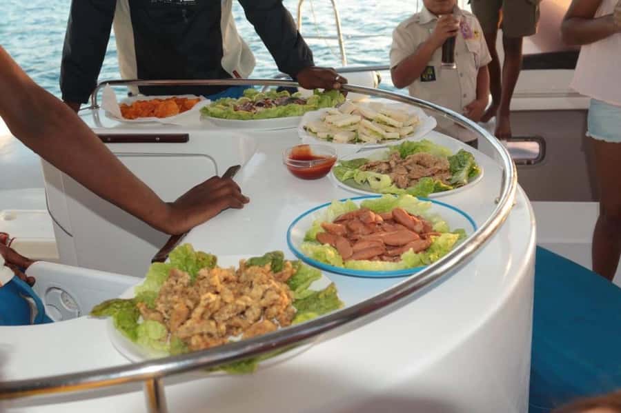 Ilot Gabriel: Catamaran Cruise & BBQ Lunch - Grand Bay start: the dinghy transfer to a catamaran anchored offshore