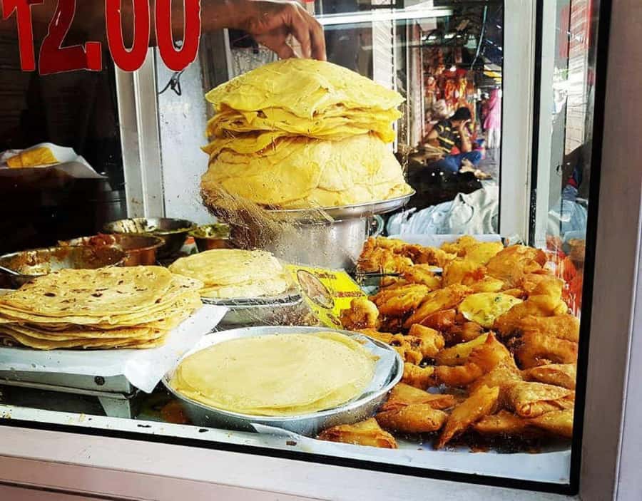 Mauritius: Port Louis Street Food Walking Tour - Port Louis starts at Le Caudan, then you cut into local streets
