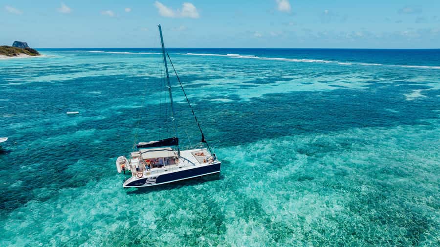 North of Mauritius: Catamaran Cruise w/ BBQ Lunch - Gunner’s Quoin and Coin de Mire, plus the Paille en Queue bird game
