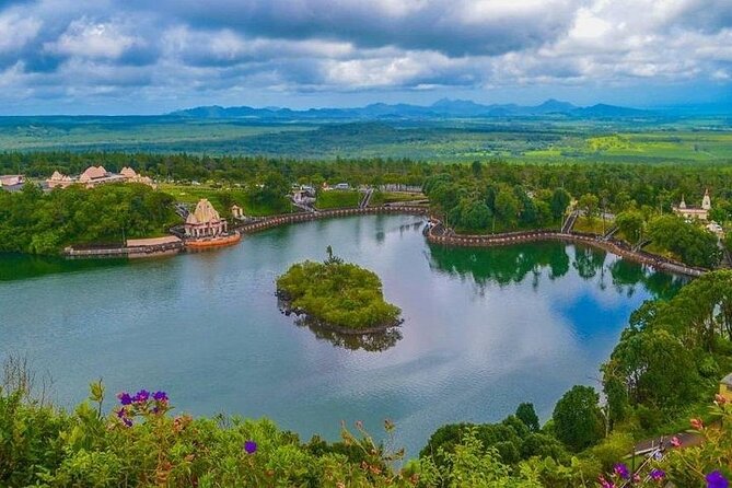 Southern Tales: Full-day incl Crocodile Park & 23 Colored Earth - Chamouny waterfall: a single-drop fall in dense vegetation